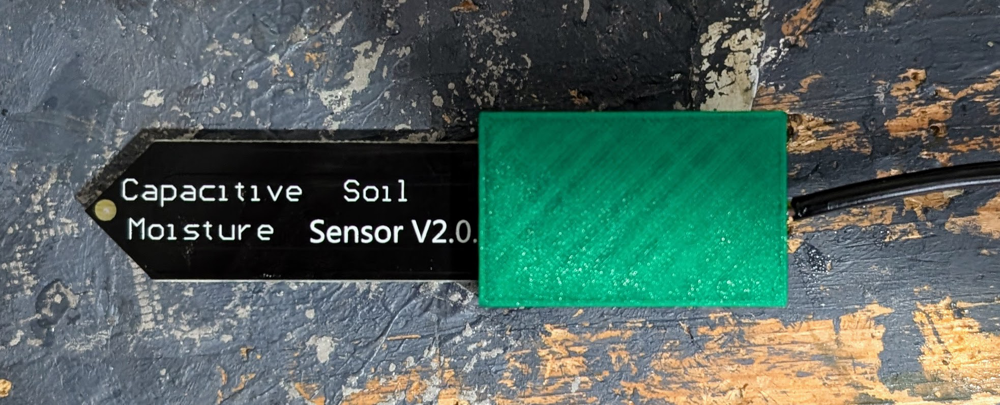 Moisture sensor cap filled with silicone (front)