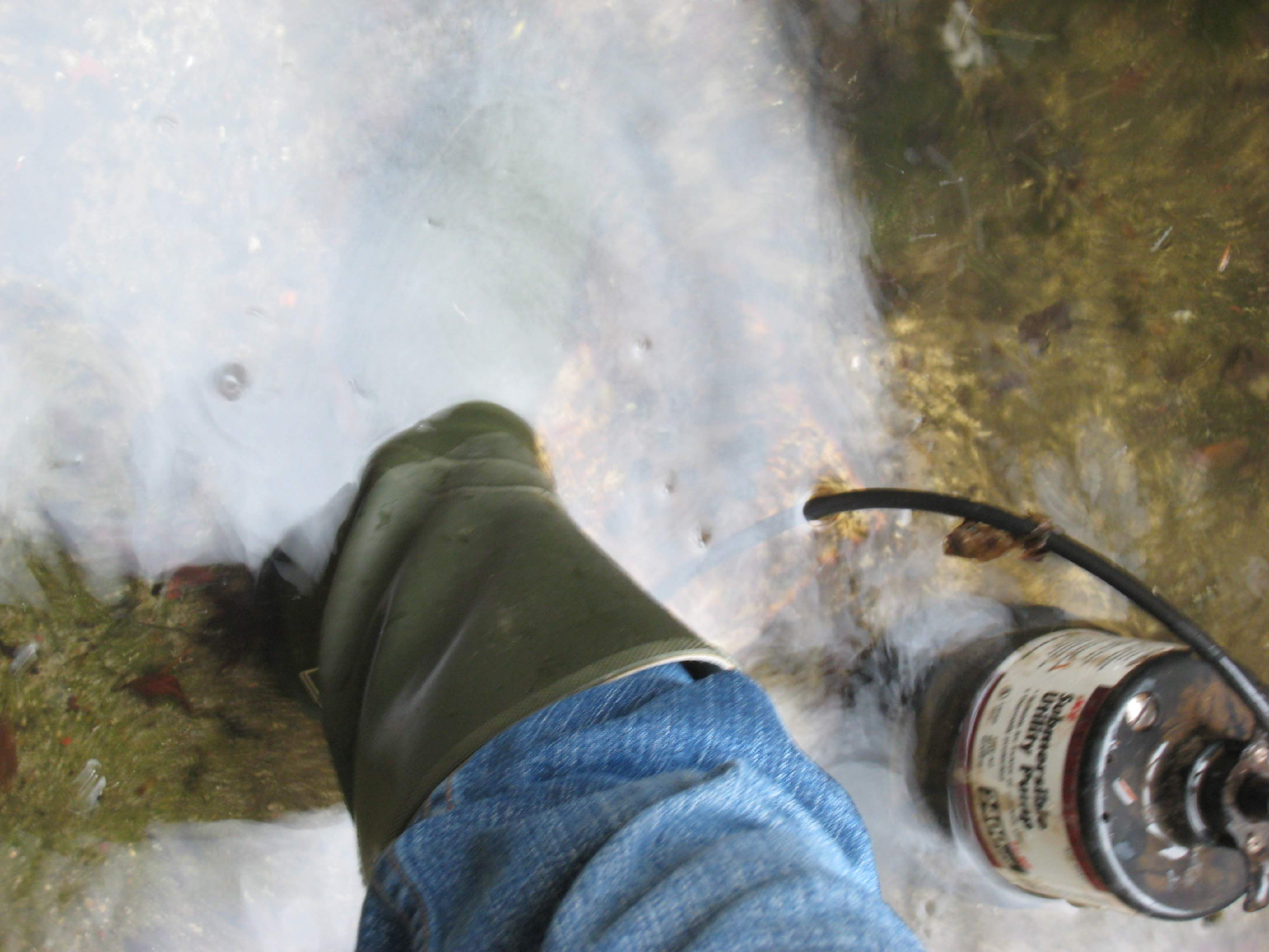 Flooded basement showing water on the floor, motivating the need for leak detection