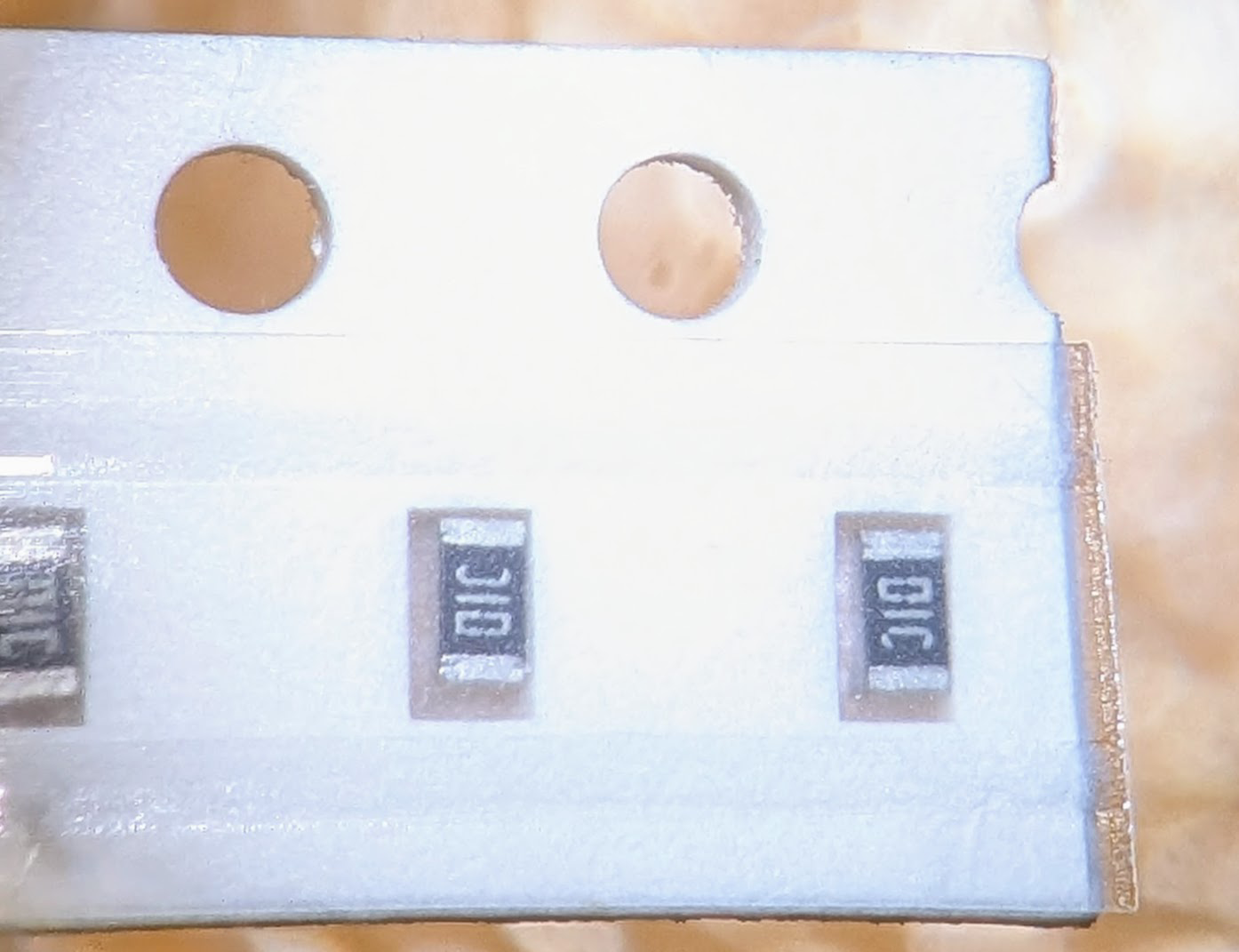 SMT tape viewed through a microscope