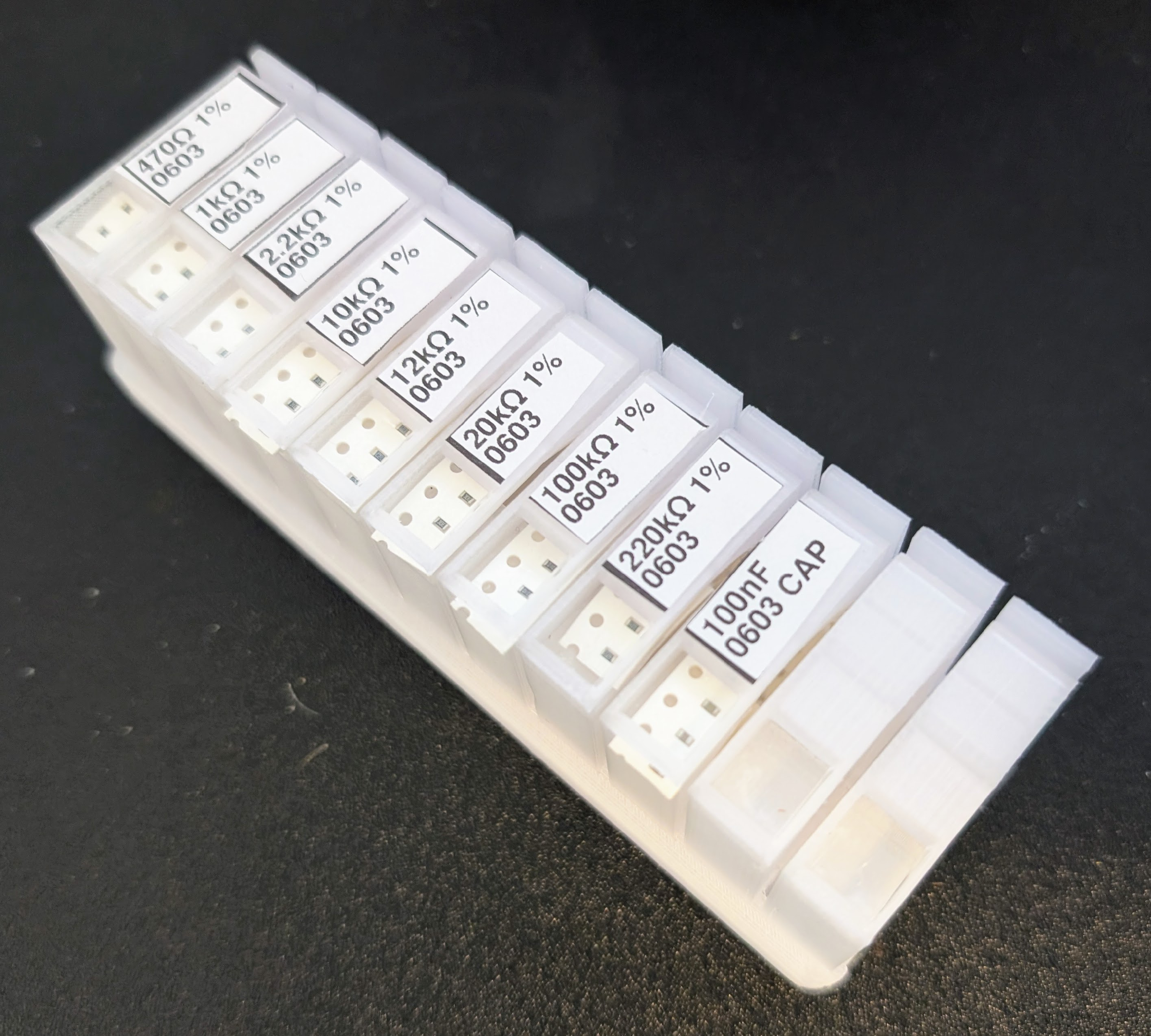 SMD component tape dispensers mounted on Gridfinity rail