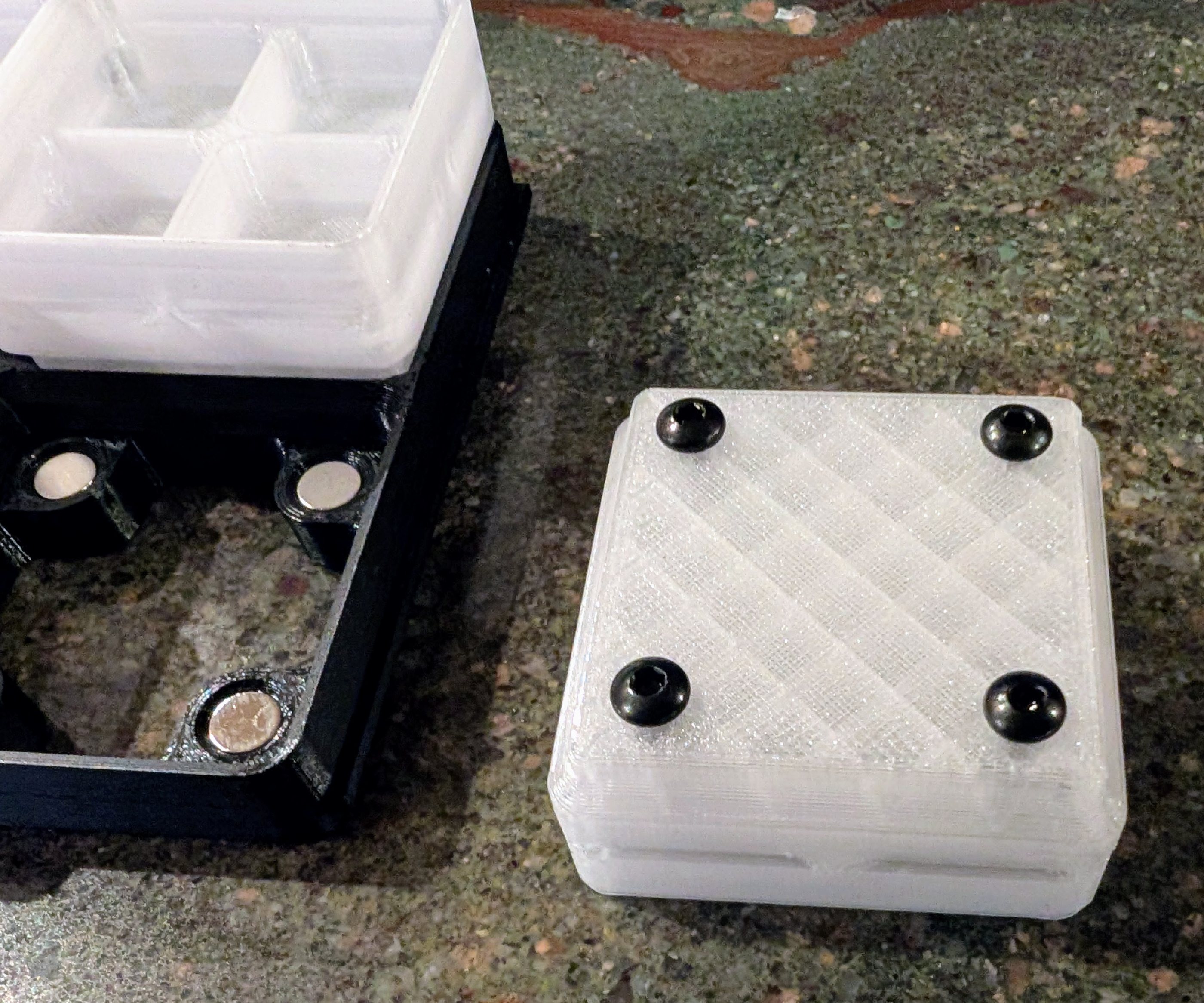 M3 screws and magnets hold bins in place