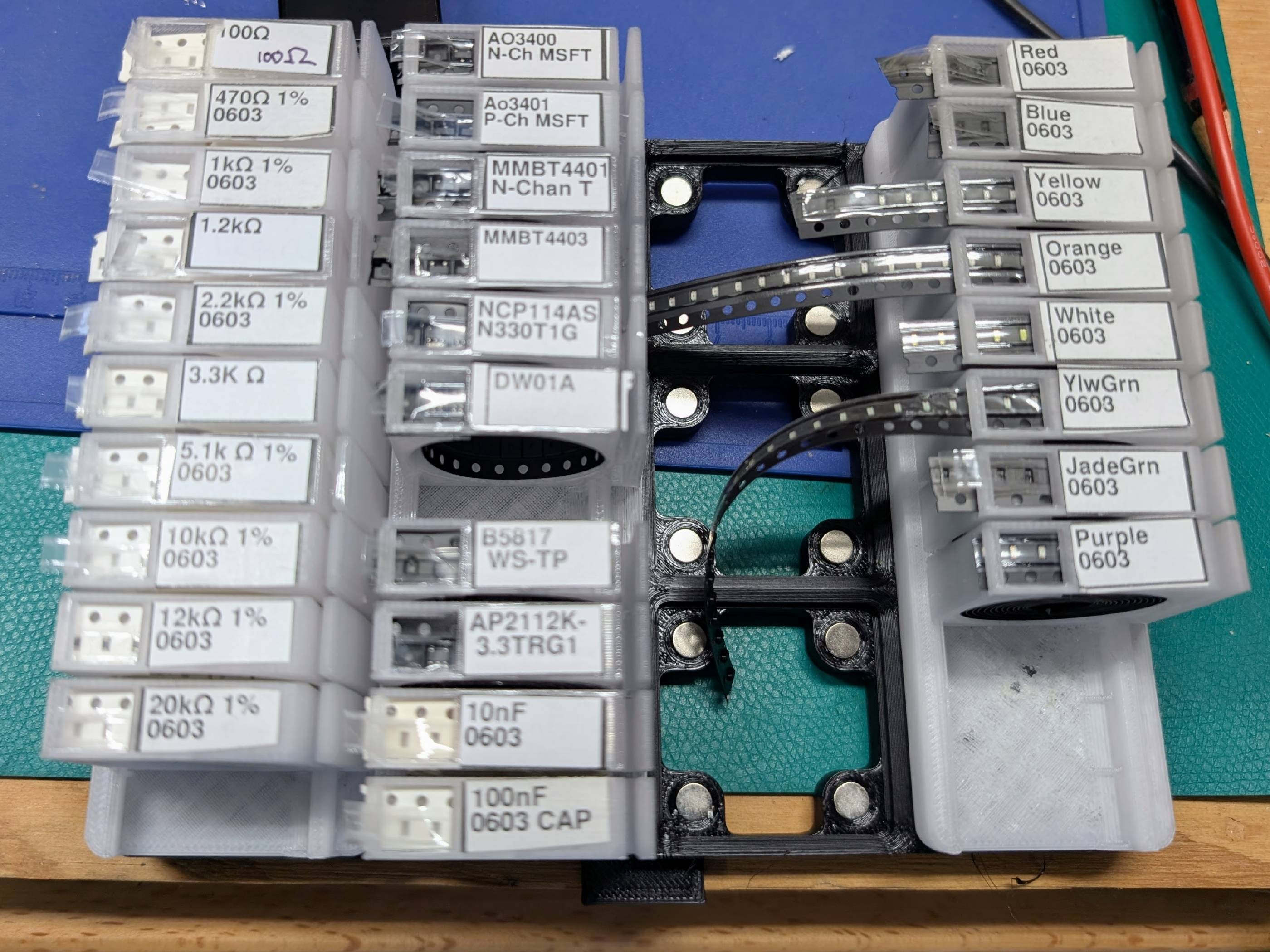 Shelf of SMT component tape dispensers